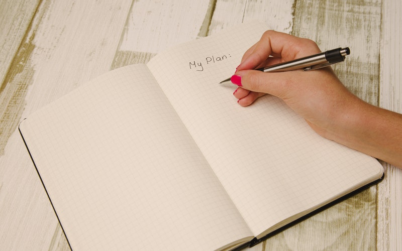 journal pages, woman's hand using pen