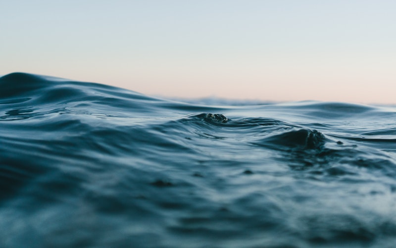 close up of ocean water, eye level with the water line