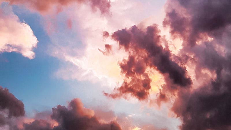 marbled sky of blue, white, burgundy, pink