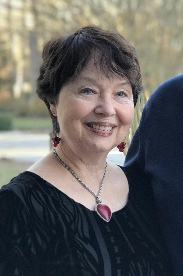 Author, Sandra Julian Barker headshot for her podcast episode and her guest blog post on story