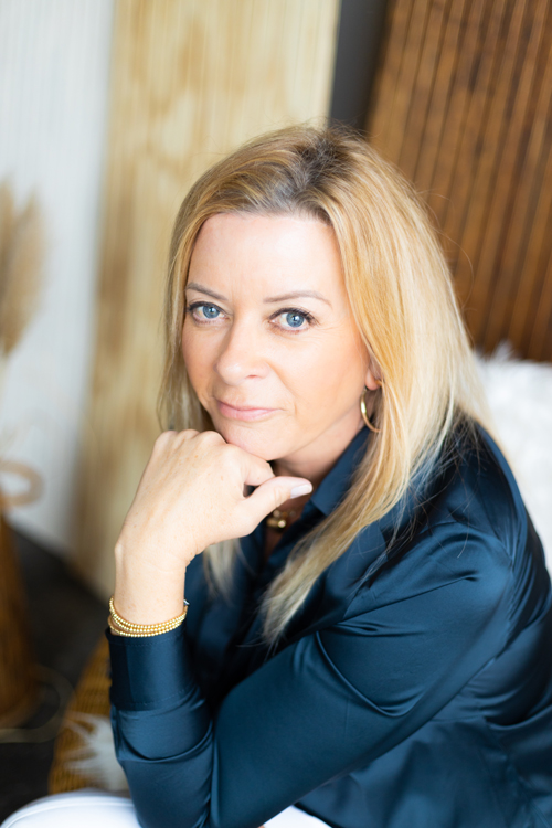 Close up of Sherrie with her chin on her hand